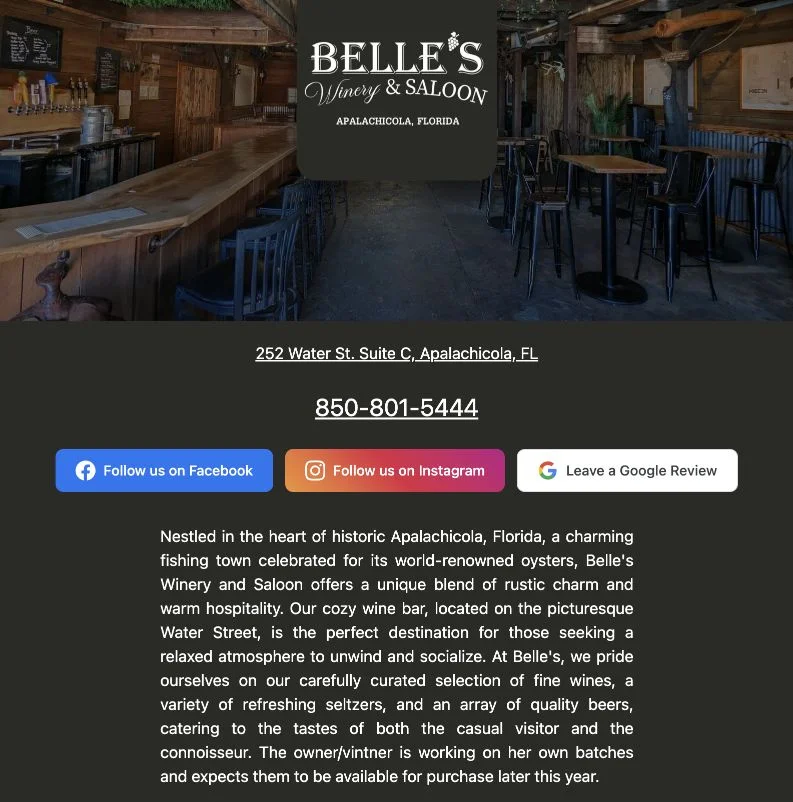 Belle’s Winery and Saloon website with its logo over a photograph of the wine bar and visitor information below.